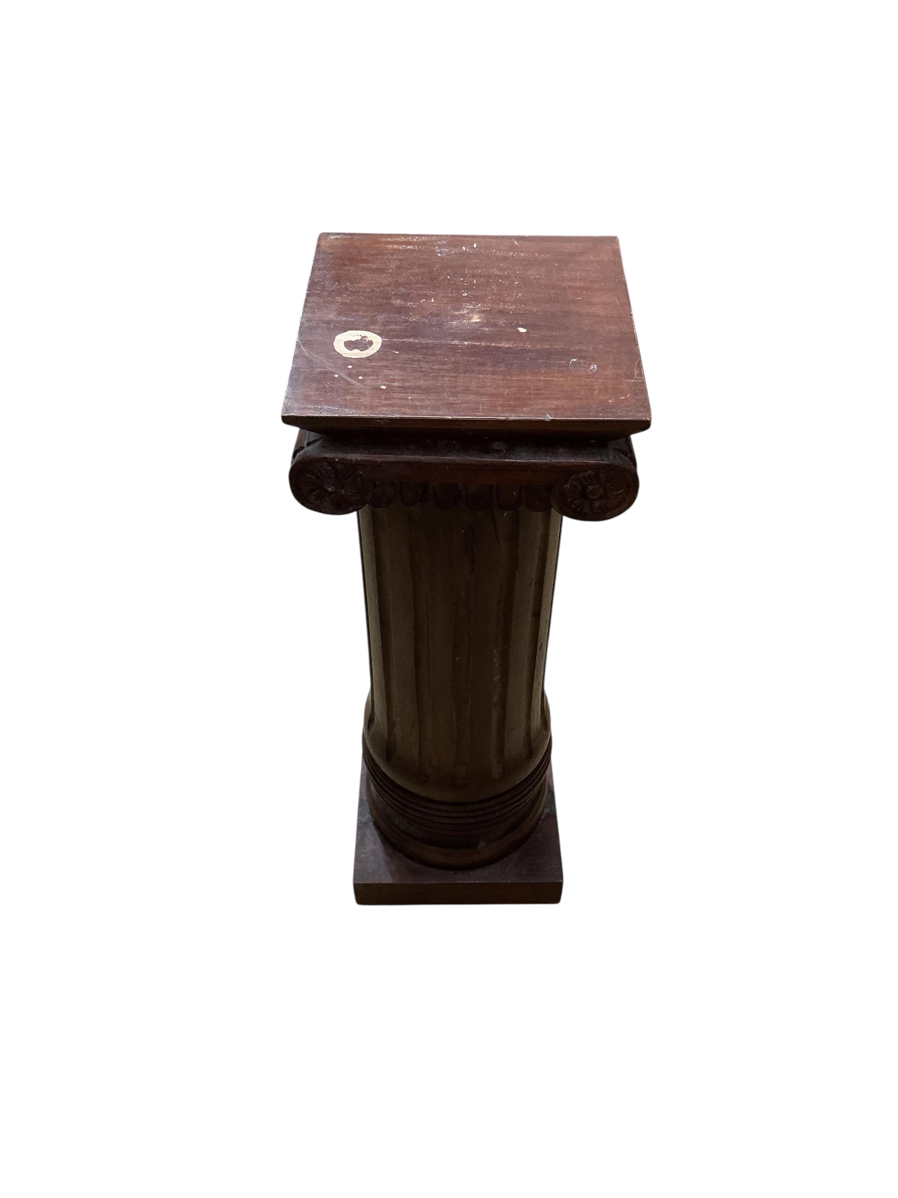 A reproduction mahogany ionic column pedestal, height 62cm